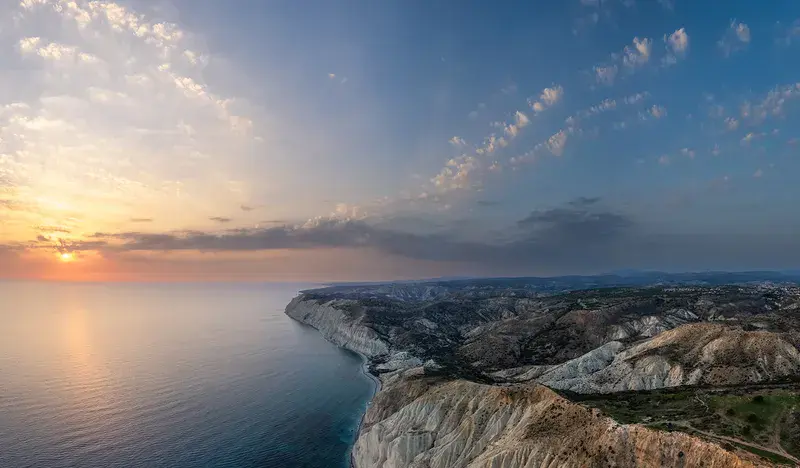 Sunset near cape Aspro cliffs aerial panorama from drone, Limassol, Cyprus