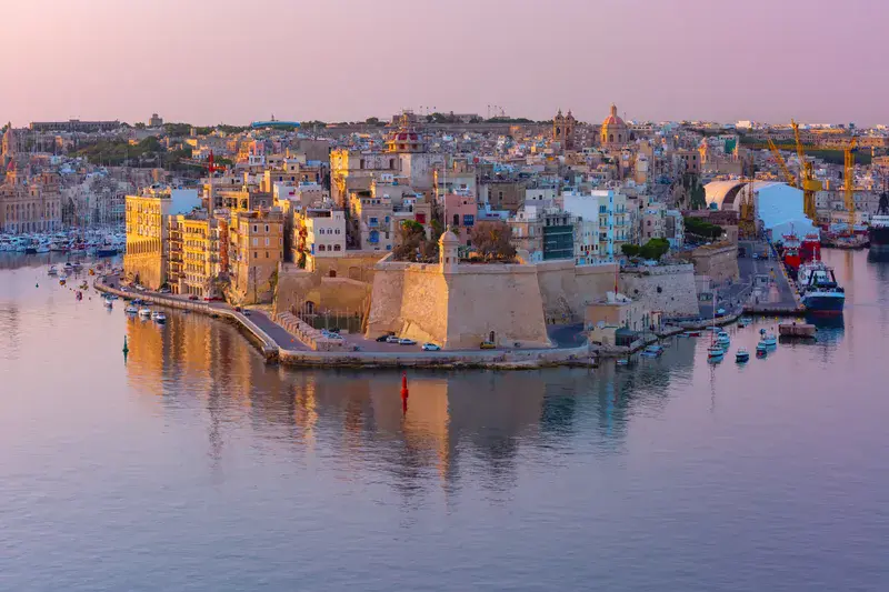 Skyline aerial view of ancient Fort Saint Michael of Senglea peninsula and the Grand Harbor as seen from Valletta at sunrise, Malta.. Grand harbor and Senglea from Valletta, Malta