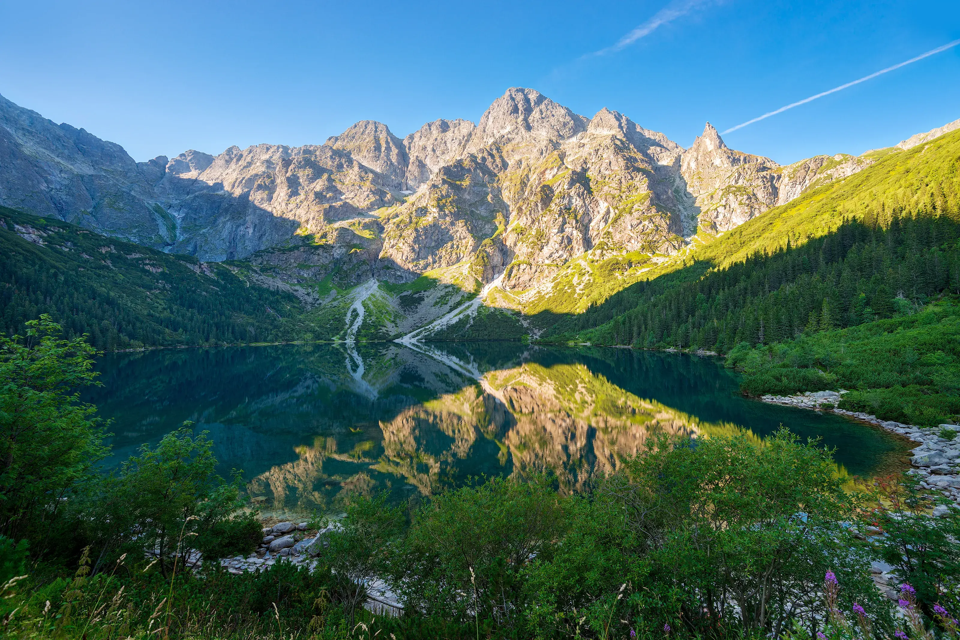 Poland lake Morskie Oko in the Tatra mount. tourist attraction of Poland lake Morskie Oko in the Tatra mountains at dawn