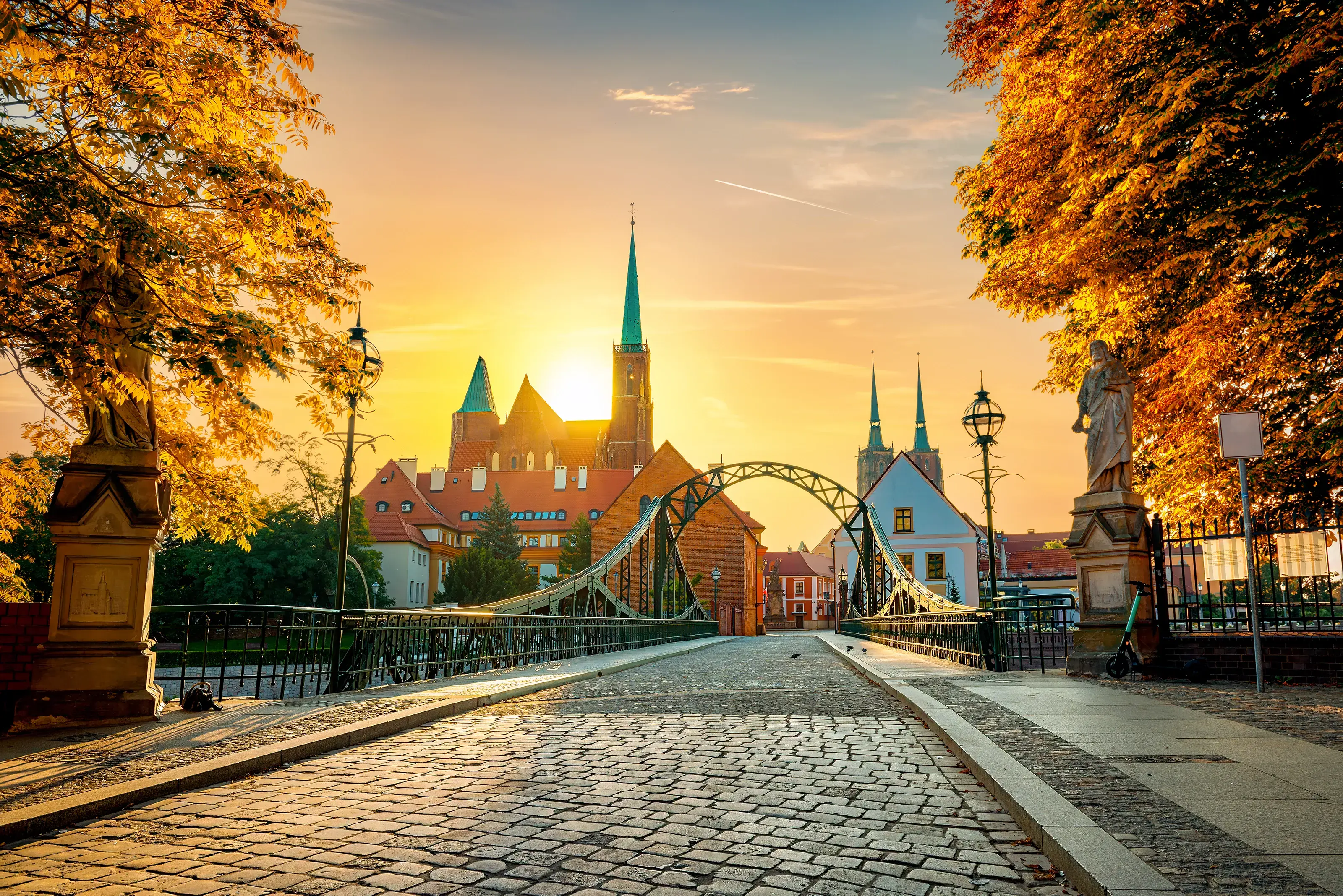 Tumski bridge and Holy Cross church in Wroclaw. Bridge of Love